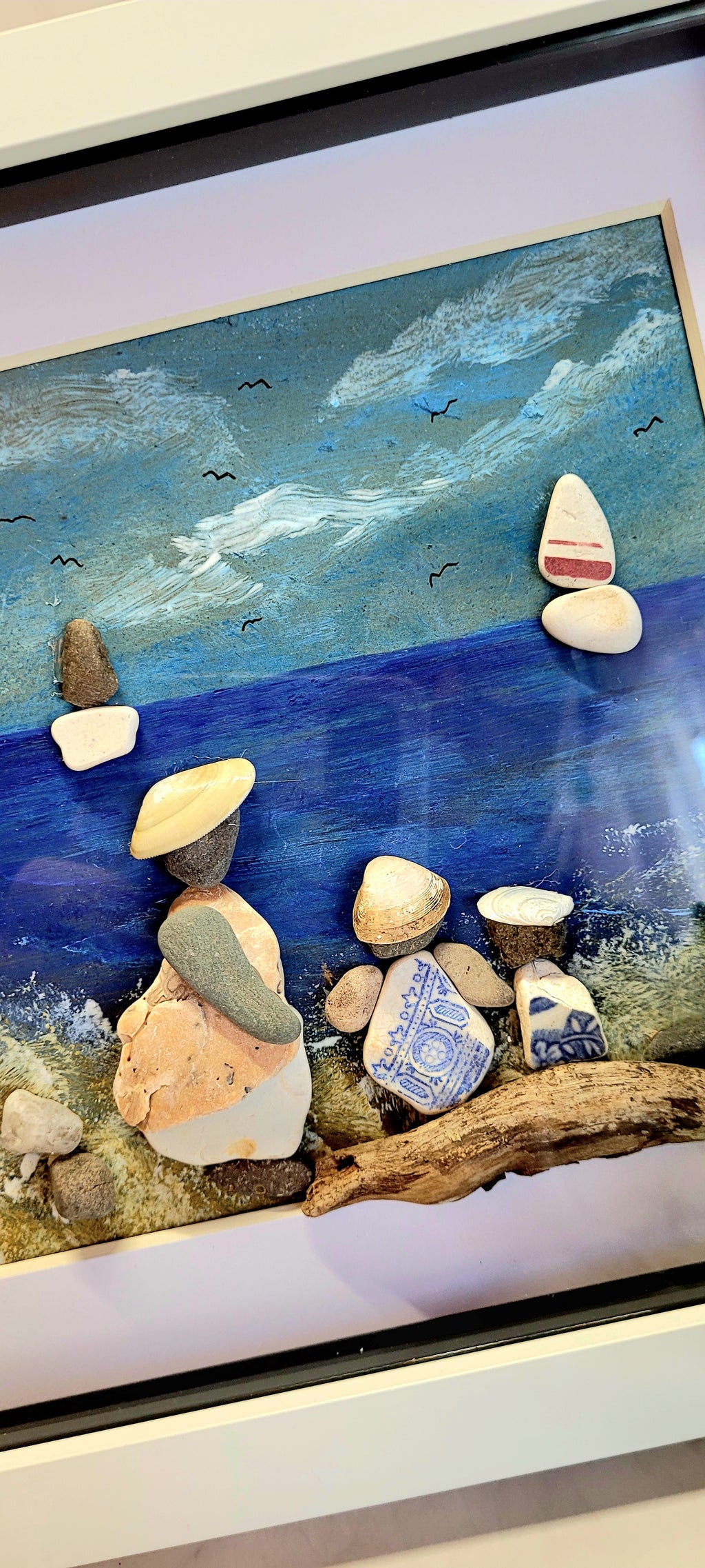 Hand painted pebble and shell framed picture