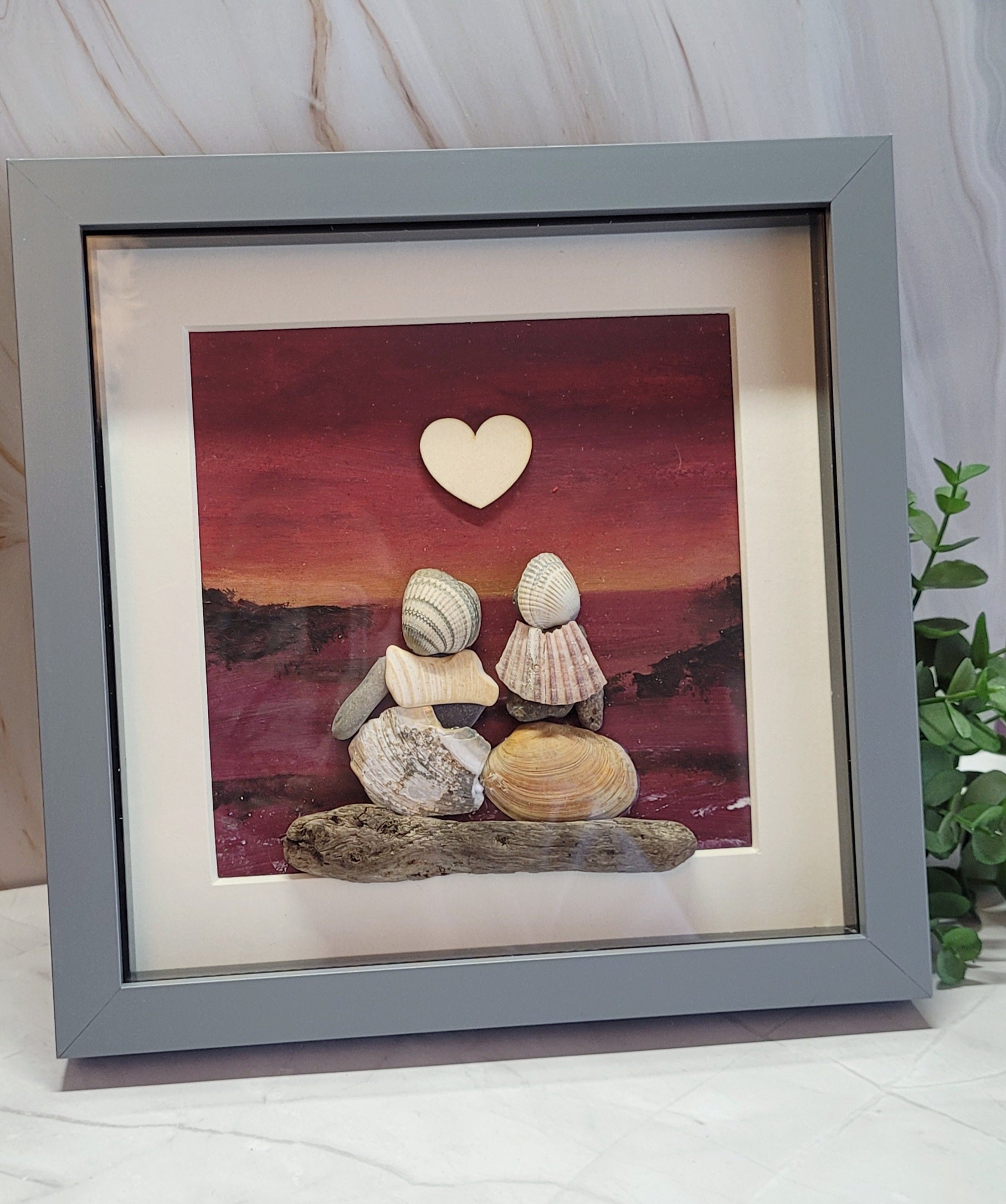 Hand-painted shell artwork